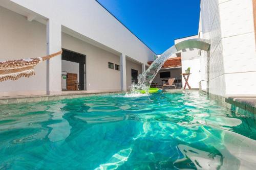 Sua Casa Perfeita c/4 Suítes e Piscina Aquecida