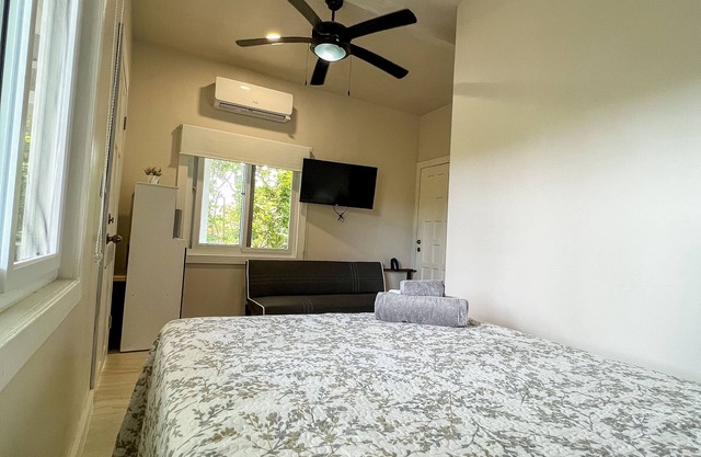 Suite 3: Full Bed + Sofa Bed, Shared Pool & BBQ, Near West Bay Beach