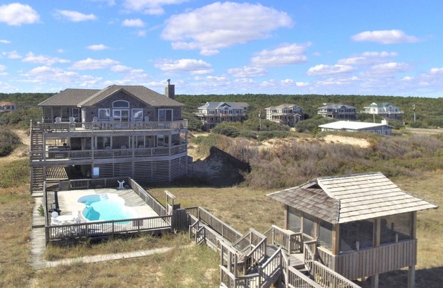 SURF VIEWS from this BEAUTIFULLY maintained OCEANFRONT