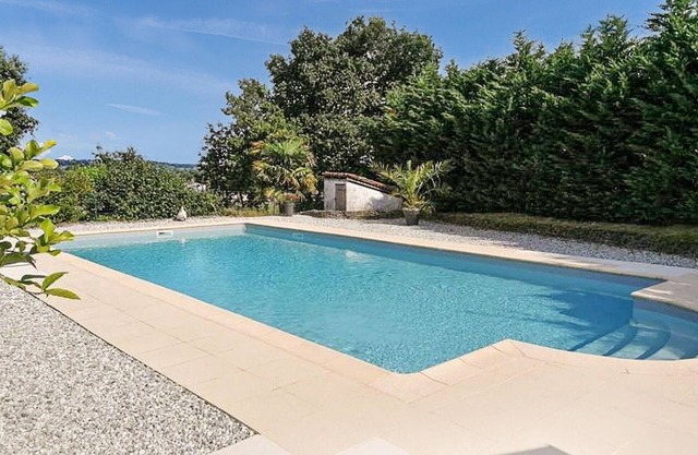 Surrounded by green and quiet countryside welcomes you this cozy cottage with communal pool.