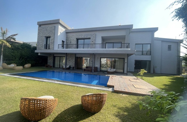 Swan Lake Luxurious Villa by Villatique