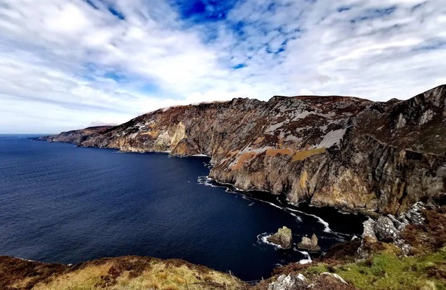 Teach Condy's Cottage nestled at the bottom of Sliabh Liag Cliffs, Co. Donegal