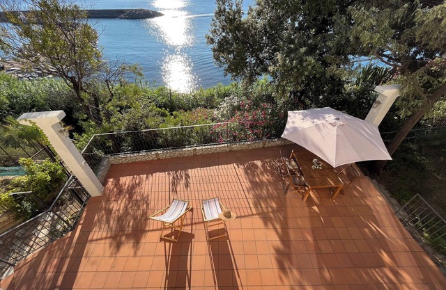 Terrace of dawn on the sea, house on the sea