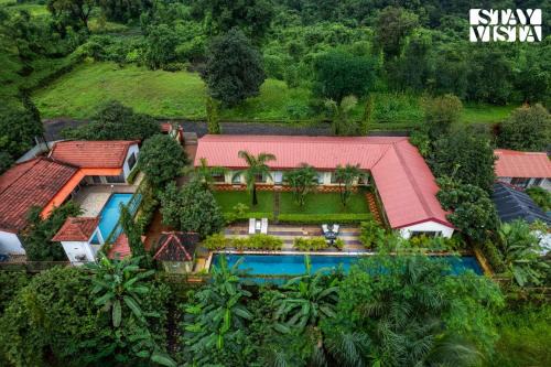 The Green Lagoon by VEO - Part of StayVista with Pool, Lawn, Wi-Fi