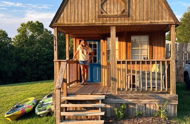 The Little Sugar Shack, a rustic tiny cabin with hot tub access & fiery sunsets!