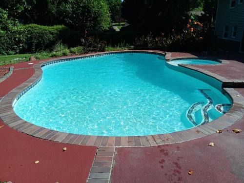 Theater, heated pool and hot tub near HPU and Furniture Market