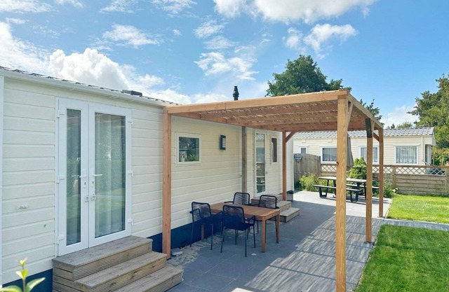 This is a brand new chalet with free WIFI, air conditioning, central heating, two bedrooms and a fully equipped kitchen.