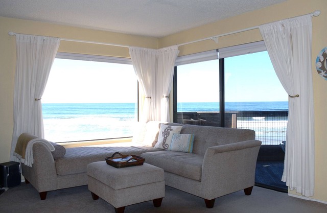 Top level, premium oceanfront condo with 180° unobstructed ocean view.