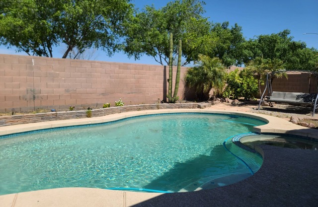 Treat yourself to this 3 bedroom/2 bath nautical oasis with a pool & spa