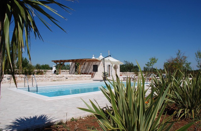 Trulli Bianchi. Characteristic stone trullo with private pool and panoramic view