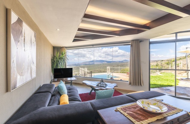 Tulia Villas by YourHost,Champagne Ridge