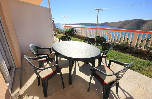Two bedroom apartment with terrace and sea view Vlašići, Pag (A-9324-a)