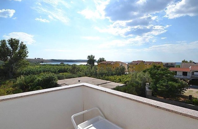 Two bedroom apartment with terrace and sea view Povljana, Pag (A-12169-a)