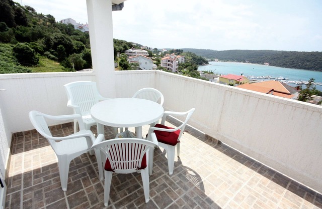 Two bedroom apartment with terrace and sea view Kampor, Rab (A-5018-b)
