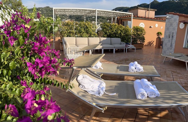 Two Double rooms with private bathrooms and an equipped roof terrace.
