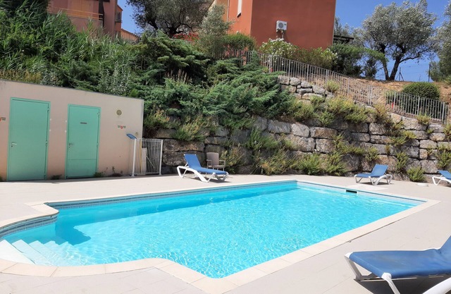 Two-storey house with terrace and shared pool