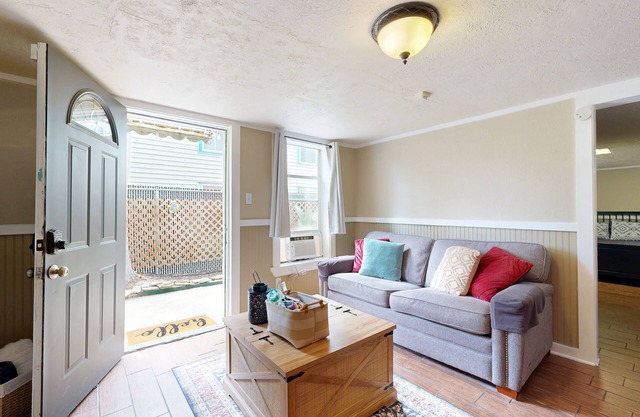 Two-Story Family-Friendly Home with balcony, patio, WIFI, TVs & great location