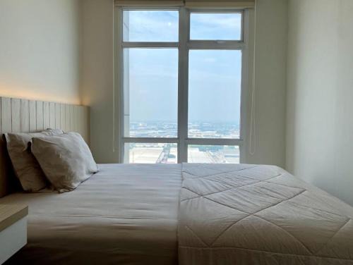 Vasanta Innopark 1BR with Sky View by Damaresa