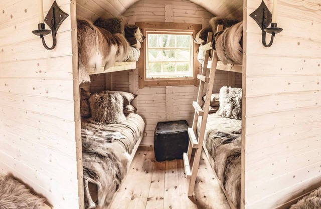 Viking Hut Balder Set Amid Rainforest w/Hot tub