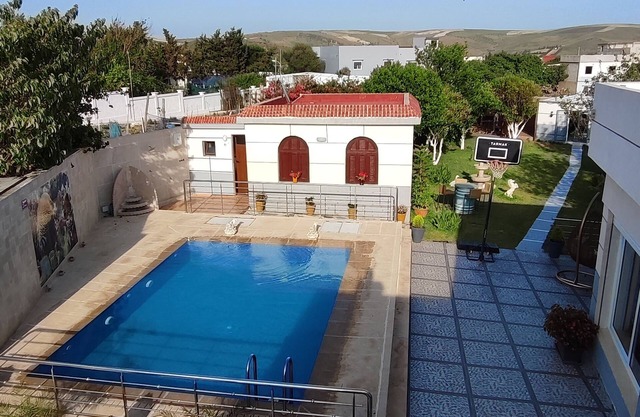 Villa NAIMA LARACHE WITH SWIMMING POOL, located in a quiet area close to the beach.