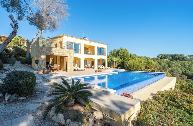 Villa 'The Beauty of Cala Tamarit' with Sea View, Pool, Wi-Fi & Garden