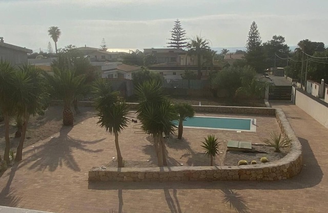 Villa with pool consisting of two apartments 500mt from the beach magaggiari