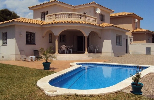 Villa with private pool, sandy beach 400m away.