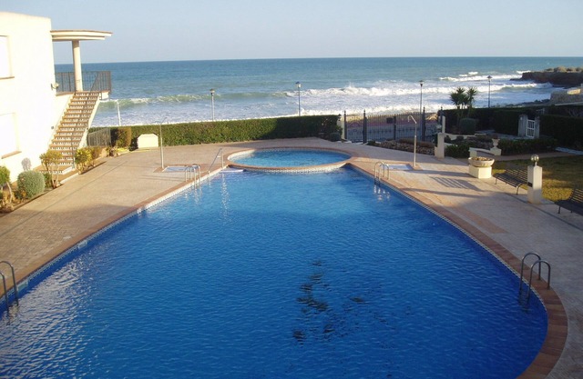VT-35059-CS: Urb. Luxury first floor beachfront with WIFI, pool and parking.