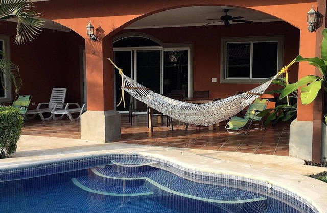 Walk to beach or enjoy private pool in this 2500 Sq/ft 3 bedroom 3 bath home