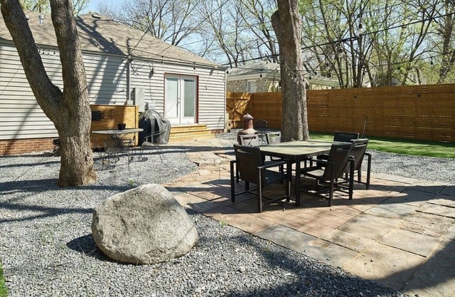 Walk to OU from this cozy house with an AMAZING back yard
