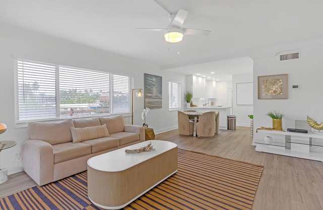 Waterfront Oasis 2BR/2BA with Pool, Gym, Balcony & Parking
