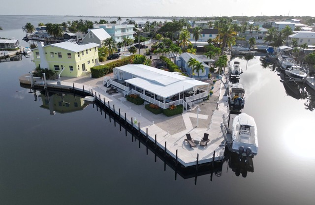 Waterfront Paradise in Key Largo: A Spacious Corner Lot with 220ft of Dockage