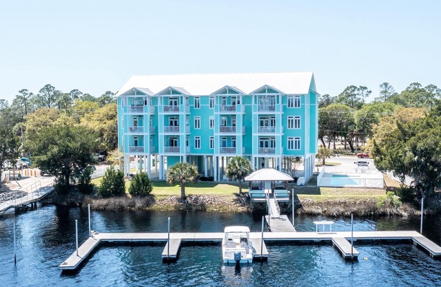 Waterfront, RIVERS EDGE CONDO #1B-BLDG 2 PRIVATE DOCK and ASSIGNED BOAT SLIP!