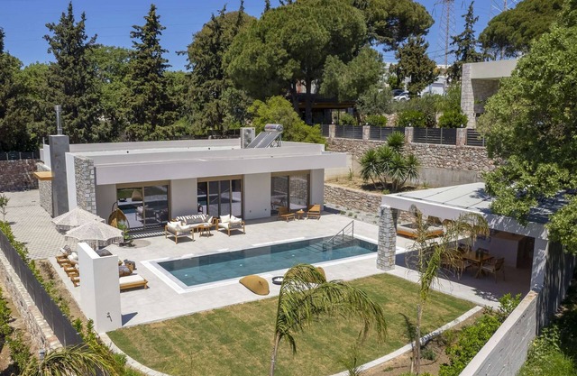 Welcome to Emerald Estate, your serene retreat on the enchanting Rhodes Island!