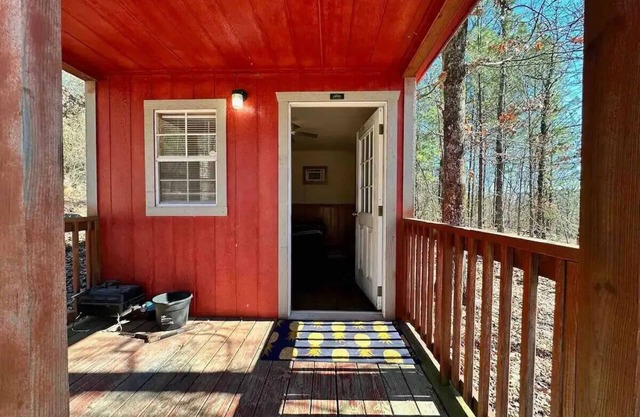 Welcome to our charming tiny house cabin at Blue Clouds Resort!