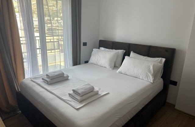 Welcome to our cozy 1 bedroom apartment with both city and sea view