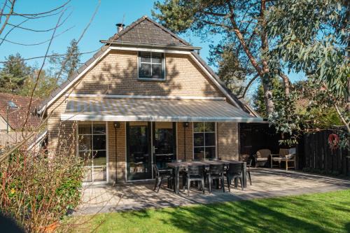 Welkom in ons huisje in het bos met prive sauna