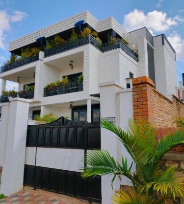 WHITE HOMEs AND ROOFTOP VIEW KIGALI