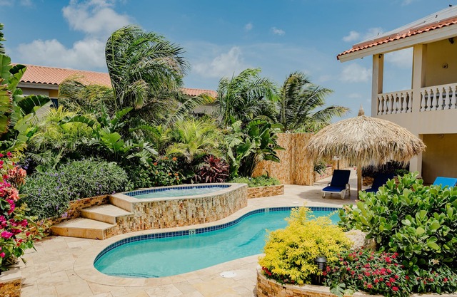 Wonderful modern 2-bedroom apartment with tropical garden, pool and whirlpool