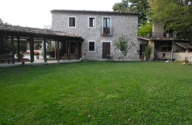 Wonderful stone farmhouse nestled in nature between forest and stream
