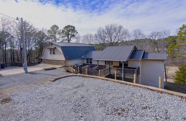 Woodland Escape, A rustic Charm meets Modern comfort in this 2BR 2BA home.