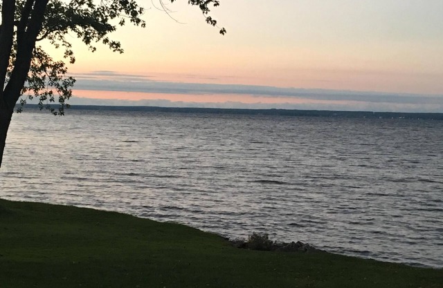 Year round beauty and tranquility in this lakefront home with dock.