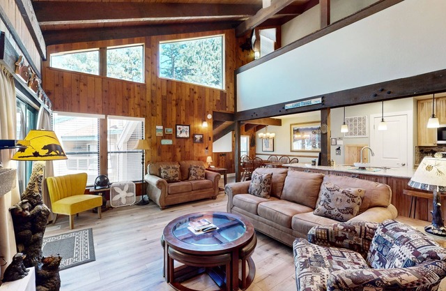 Your next vacation getaway is less than 200 steps to a private beach on the lake