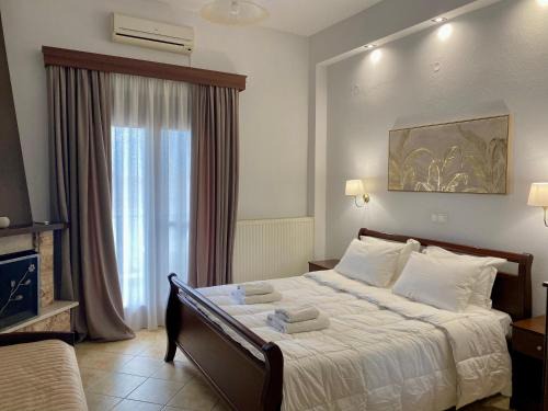 Loutraki House | Ξενώνας Ρόδον