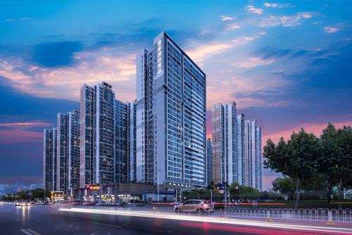 Wuhan Hotel | 壹家国际酒店欢乐谷武钢体育馆店