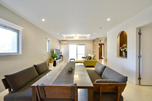 Enobi Apartment | 最大12人宿泊可能 ご友人家族と一緒にステイタイム 広々リビングでホームパーティー