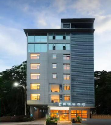 Jinghong Hotel | 龚禧里初见版纳店