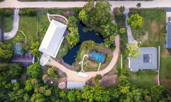 Palm Coast House | 1 Min Private Beach & River Access w Movie Room, Heated Pool, Kayaks & Game Room