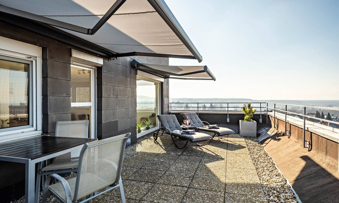 Bechlingen Apartment | 1 room penthouse with big roof terrace and unique lake and mountain view