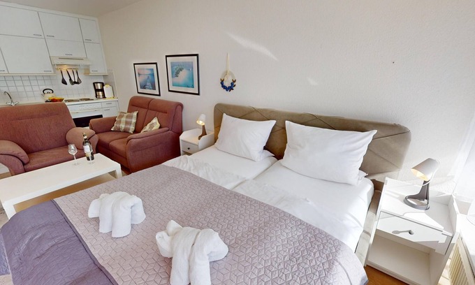 Neustadt in Holstein Apartment | 1-room vacation apartment for 2 people and dog with terrace and underground parking space